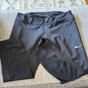 Nike crop dri-fit Black Leggings with Swoosh Logo vent on back of legs🌸
